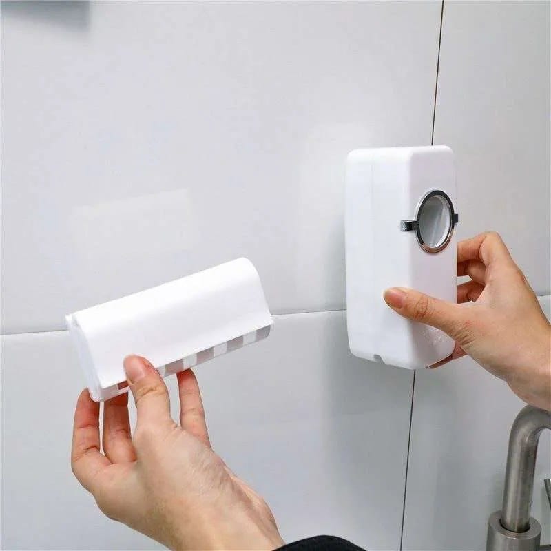 Toothpaste dispenser and brush holder