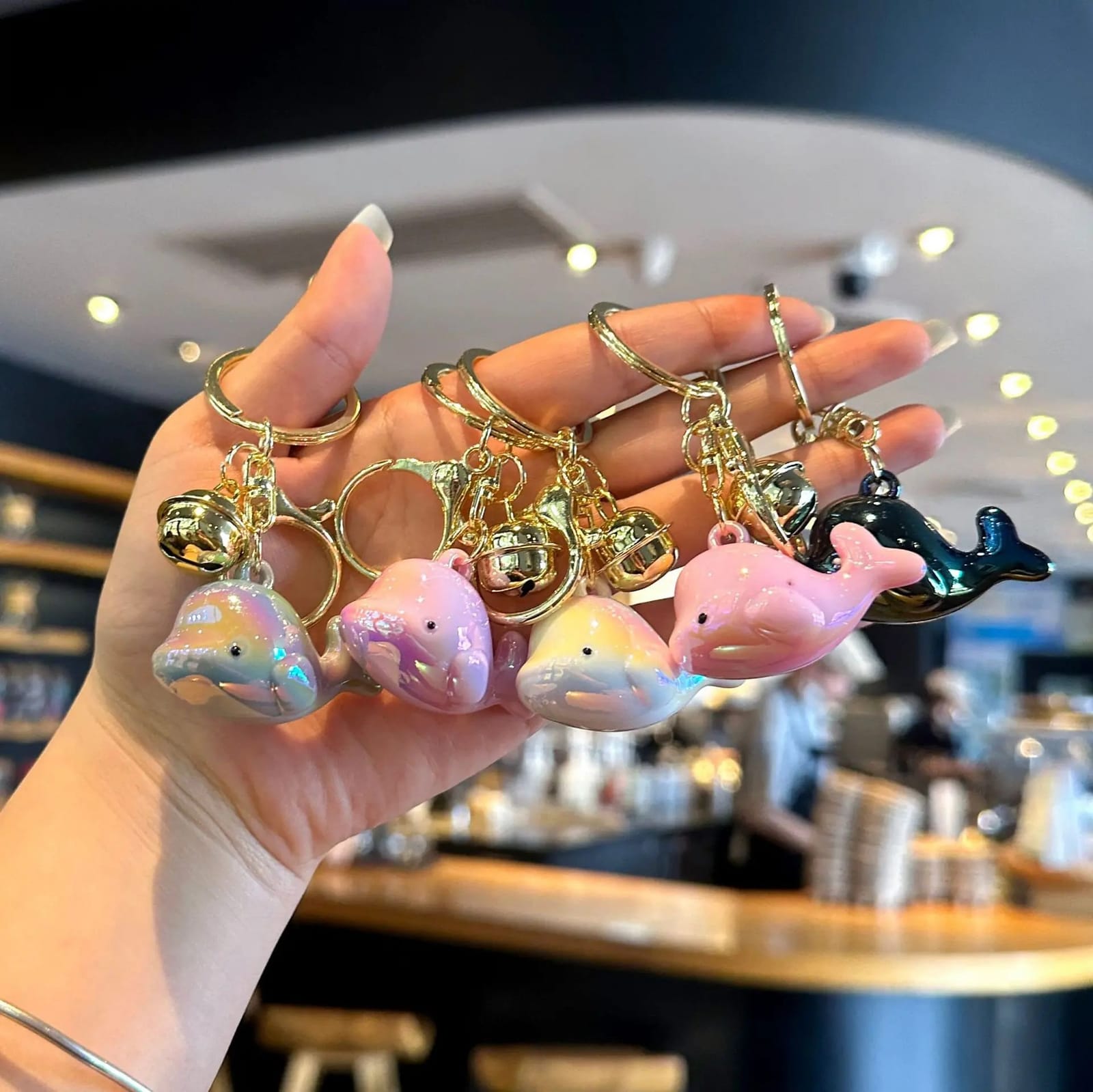 Creative electroplated iridescent dolphin acrylic keychain pendant, cute color-changing bell, colorful student backpack pendant